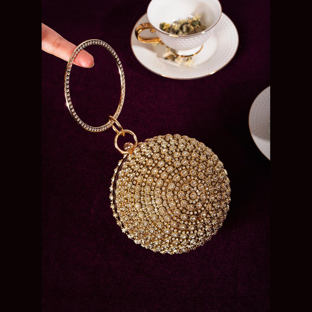 Rangoon Round Ring Handle Clutch Golden